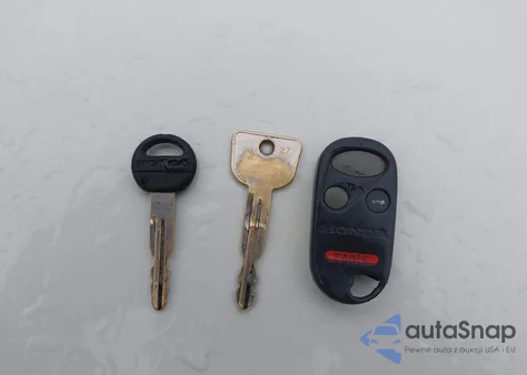 1999 Honda Cr-V Lx z USA, uszkodzony, nr VIN JHLRD1749XC015103